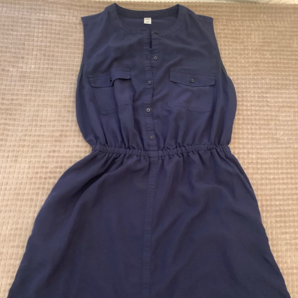 Light mini romper dress , front buttons are function and it has pockets